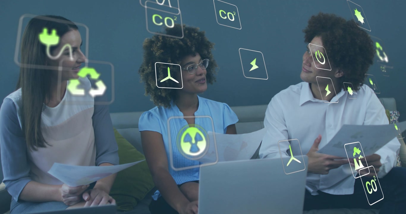 Lead presenting papers and causing energy icons drifting across laptop while team planning CO2 cuts
