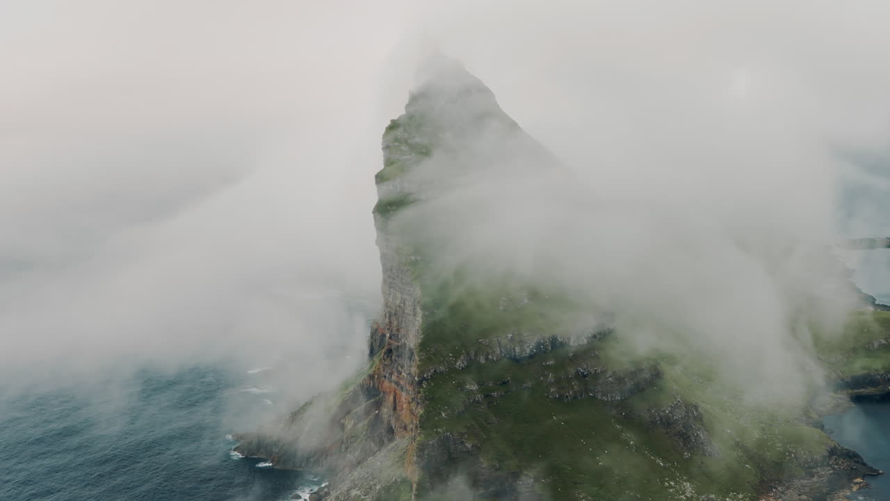 Dramatic Coastal Cliffs Shrouded in Fog