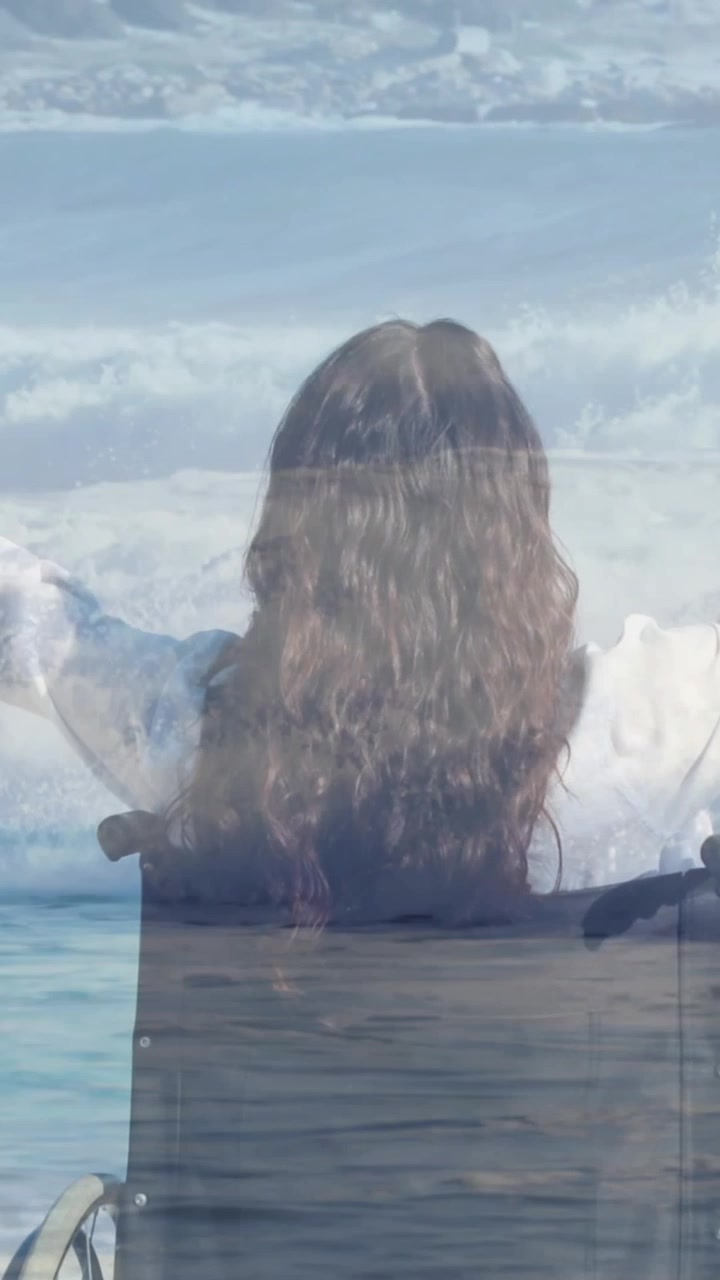 Animation of sea landscape over disabled woman sitting in wheelchair