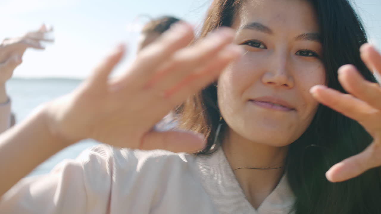 Friends having fun by the lake