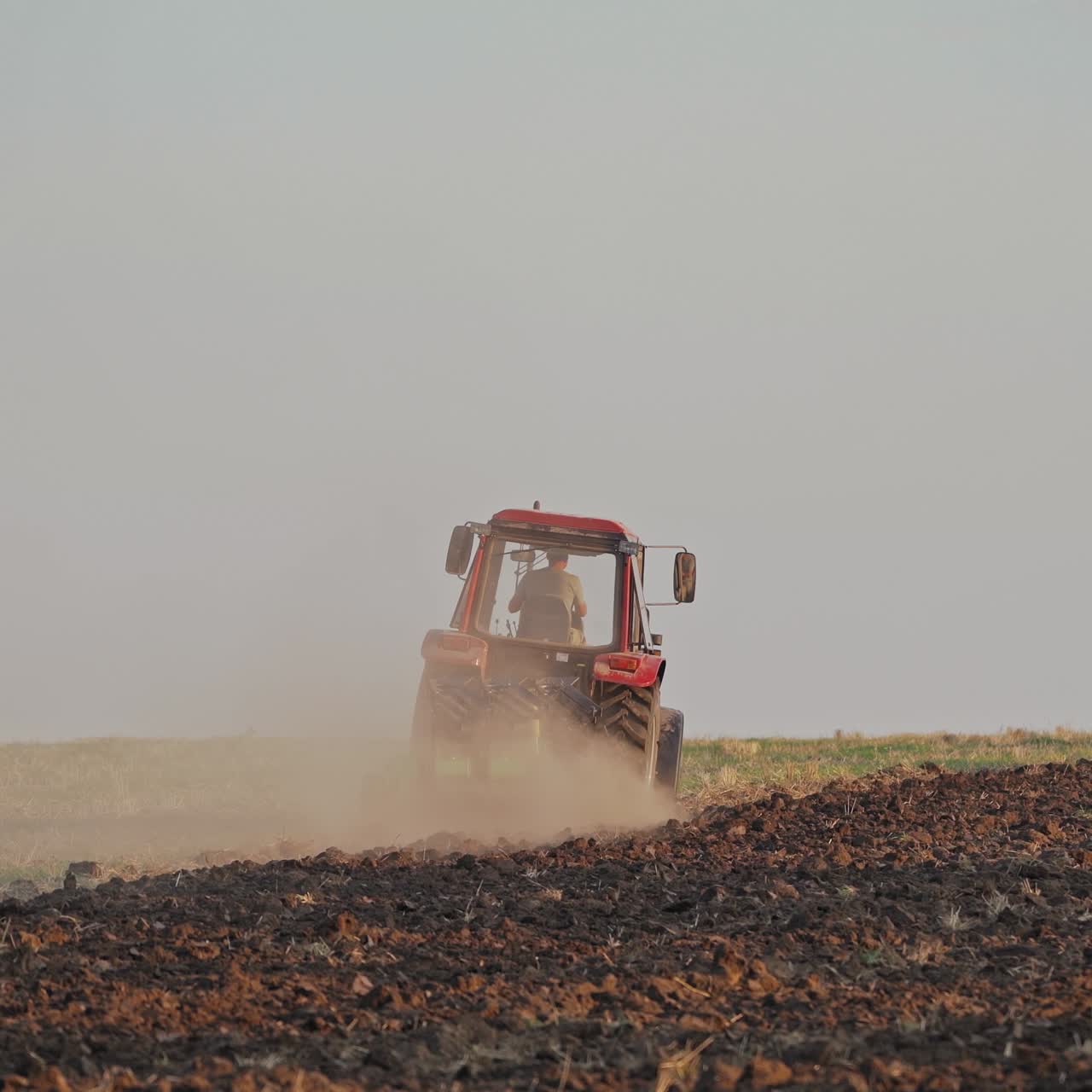 Tractor working on large field