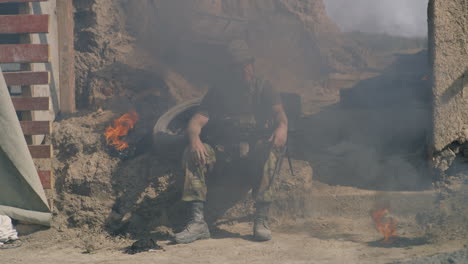 military personnel resting on a battlefield