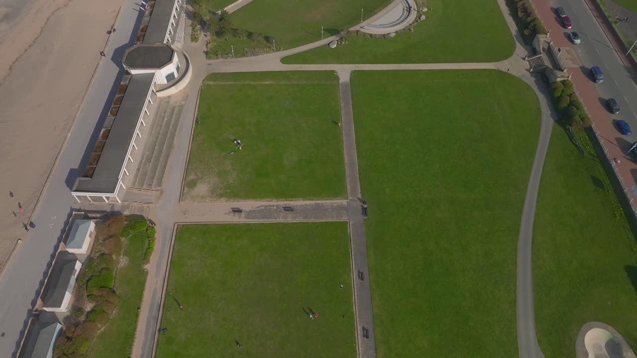 Marine Hall Gardens Fleetwood with reveal of fitness centre and car parks. Lancashire, UK.