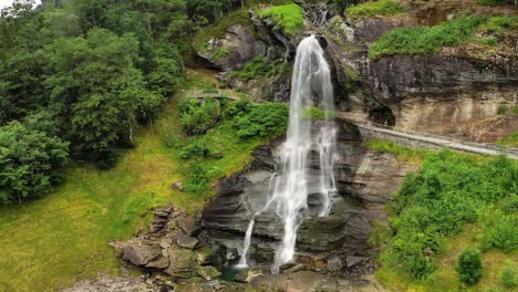 Steinsdalsfossen-is-a-waterfall-in-the-village-of-Steine-in-the-municipality-of-Kvam-in-Hordaland-county,-Norway.-The-waterfall-is-one-of-the-most-visited-tourist-sites-in-Norway.