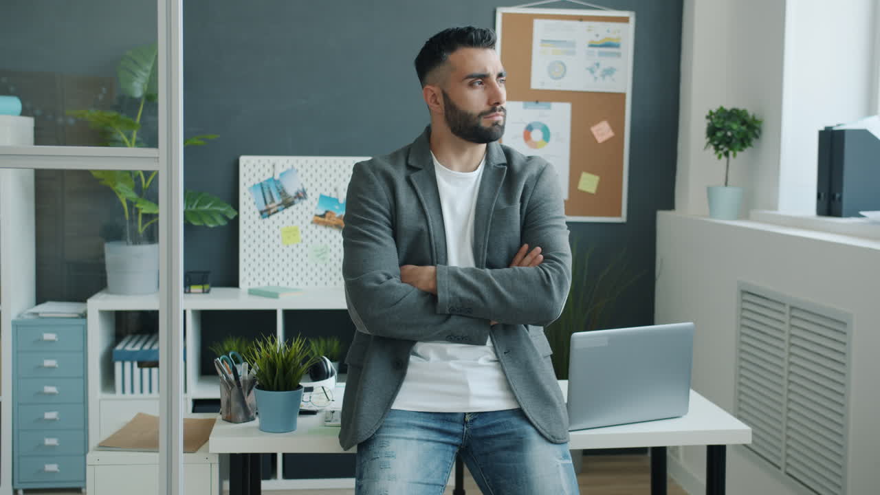 Businessman in office considering something