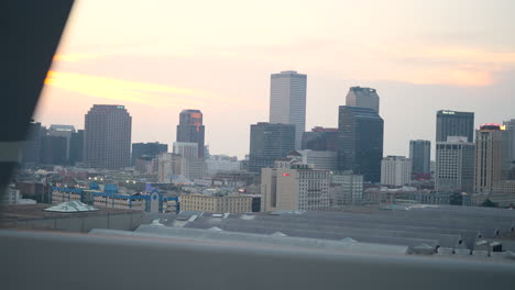 drive through crescent city connection bridge view of new orleans city sunset, louisiana united states, golden skyline