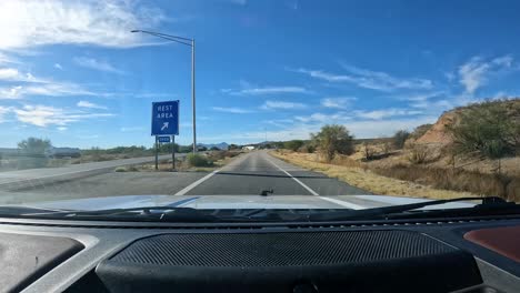 pov - driving into the canoa rest area off of interstate 19 in southern arizona on a sunny afternoon