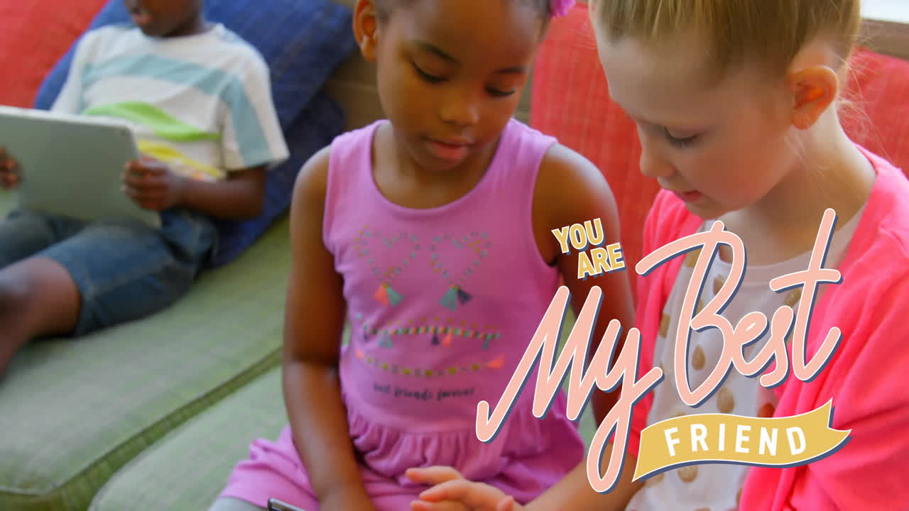 Animation of you are my best friend text over diverse girls using tablet on couch