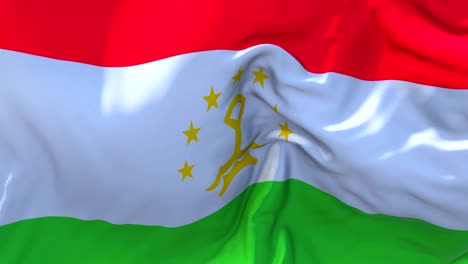 tajikistan flag waving in wind slow motion animation . 4k realistic fabric texture flag smooth blowing on a windy day continuous seamless loop background.