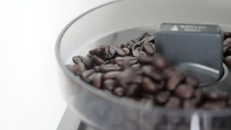 Medium-shot-of-beautiful-rich-brown-espresso-beans-falling-down