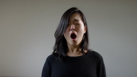 asian woman sneezing with the corona virus