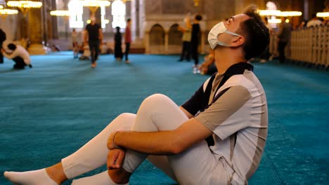 Hagia-Sophia-Istanbul-Masked-man-examining-interior-Hagia-Sophia