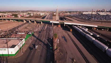 aerial-panorama-of-San-Pedro,-industrial-zone,-shipping-industry,-and-rail-yard