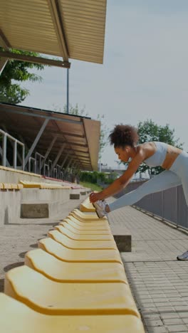 woman stretching outdoors