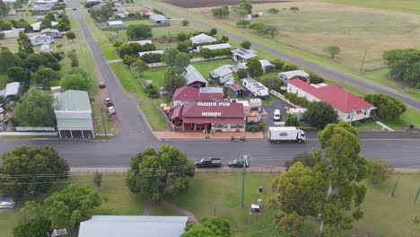 aerial view of rural town and moving truck