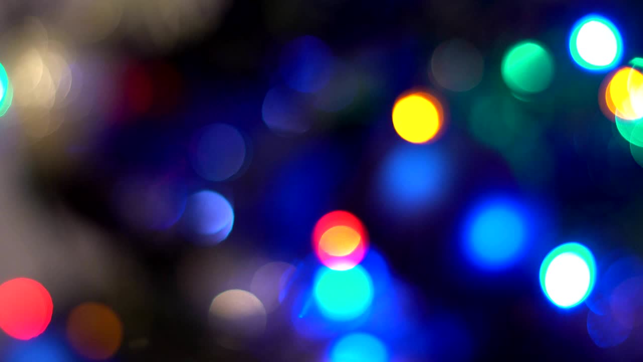 Sfondo di luci natalizie. Sfondo luminoso festivo.