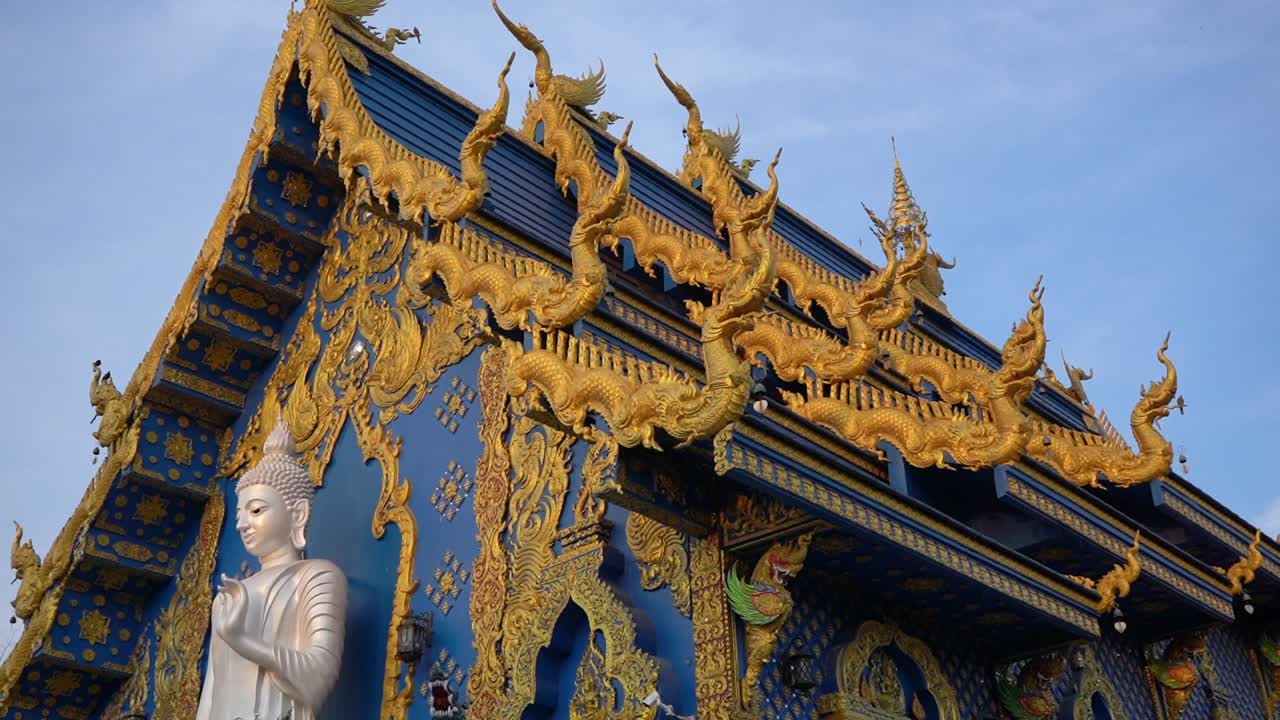 Wat Rong Sear Tean (Blue Temple) roof golden decoration. Chiang Rai, Thailand.