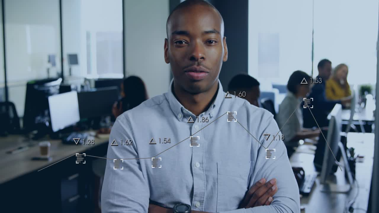 Man standing in open-plan office, camera zooming starting overlay on torso showing business data