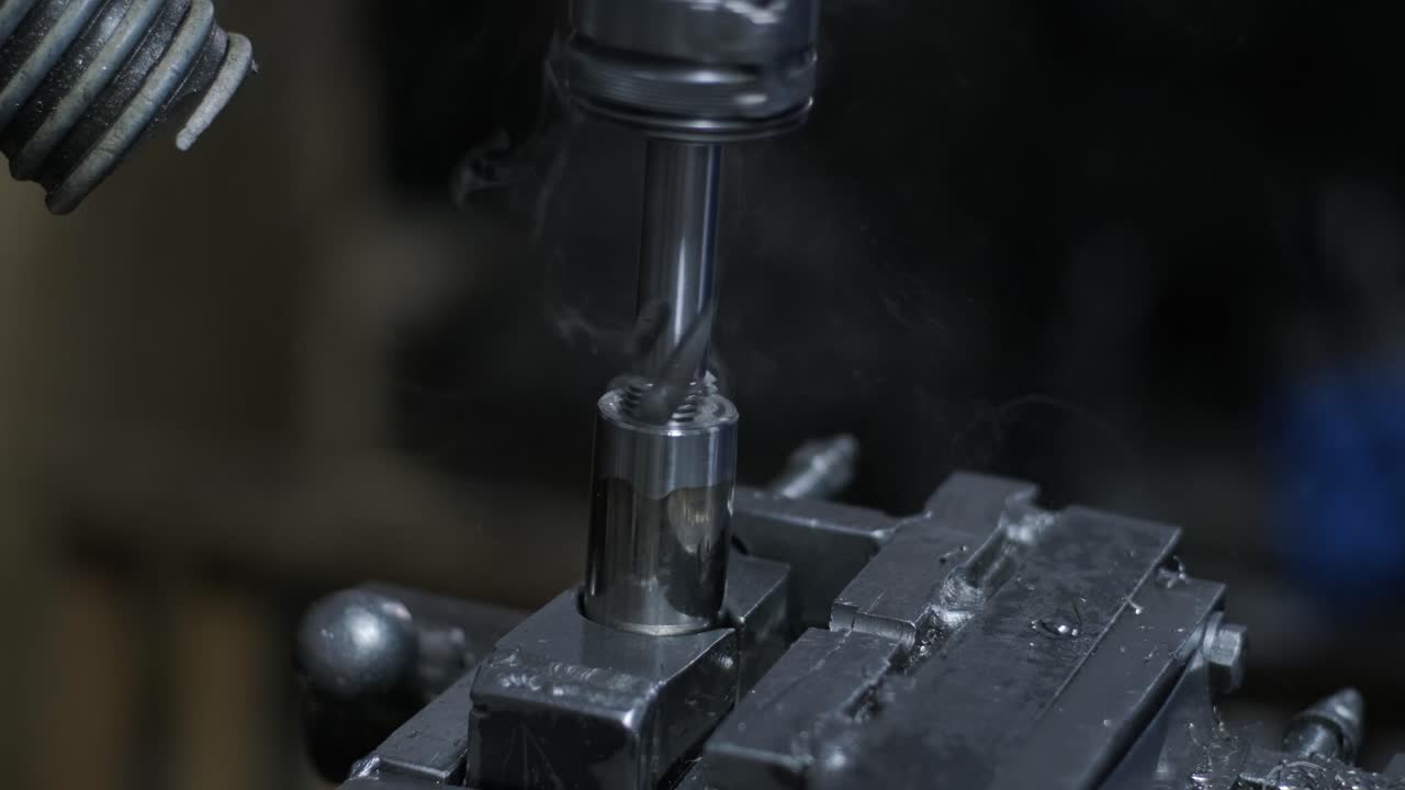 Drilling machine with drill bit for tapping