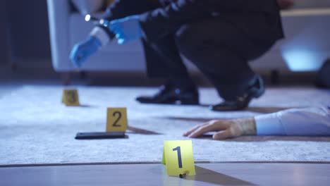 policeman in suit carefully examines evidence with gloves and tweezers at crime scene.