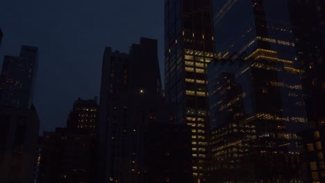 day to night - timelapse of the spiral 66 hudson boulevard skyscraper in new york city - midtown manhattan