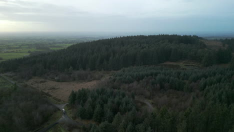 Forest-road-reveal-with-vehicle-activity-at-Beacon-Fell-Country-Park