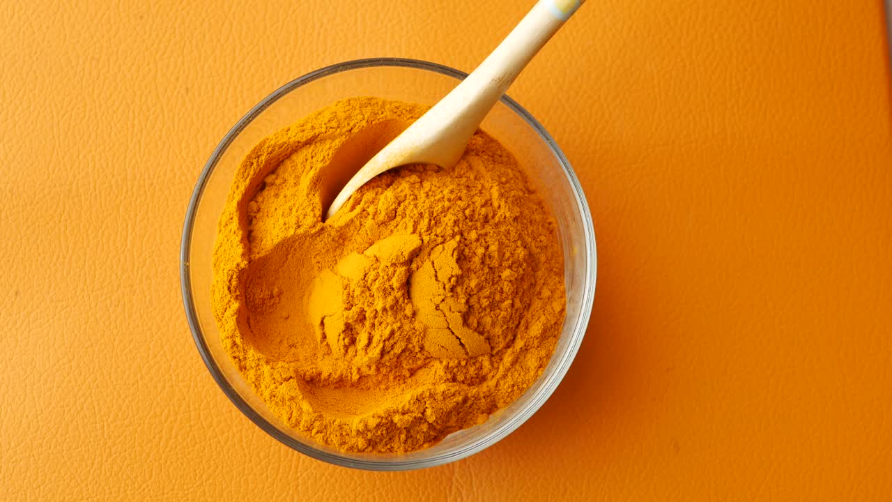 Turmeric Powder in a Bowl