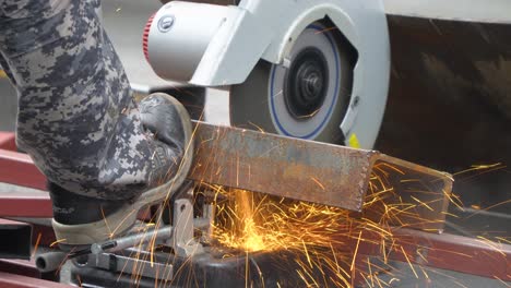 Macro-Shot-Of-A-Cut-off-Wheel-Machine-Cutting-A-Channel-Beam---close-up