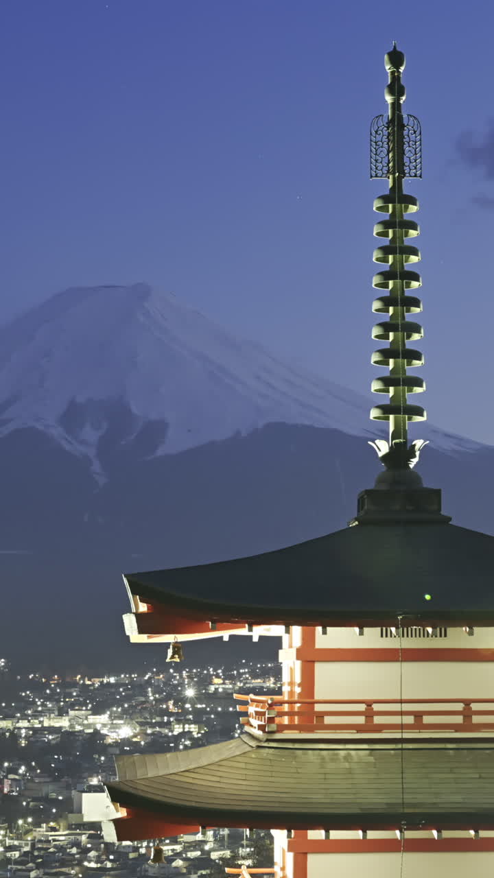 Timelapse from Chureito Pagoda with Mount Fuji at twilight showcasing serene beauty and vibrant colors