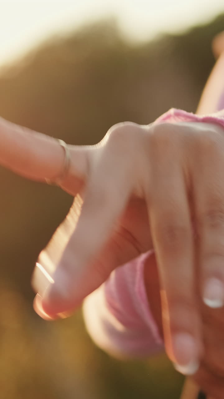 Woman Dancing Hands at Golden Hour Sunset