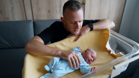 father with newborn baby