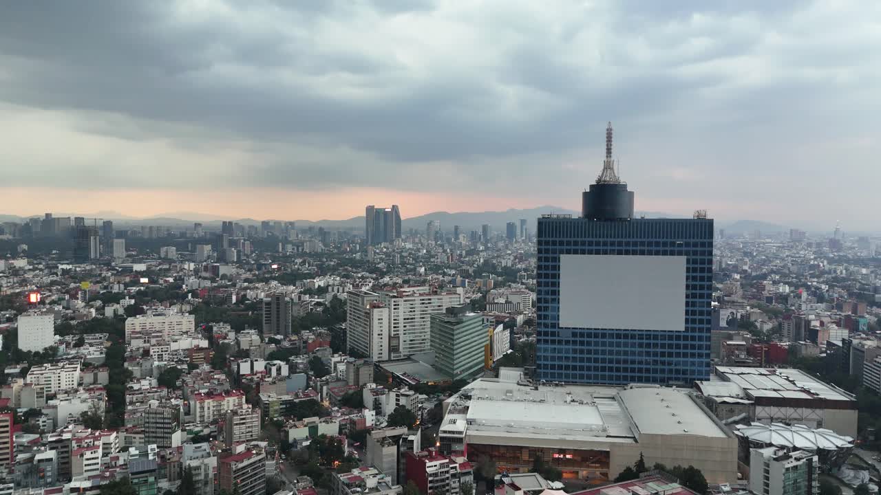 Aerial View of Mexico City Skyline at Sunset