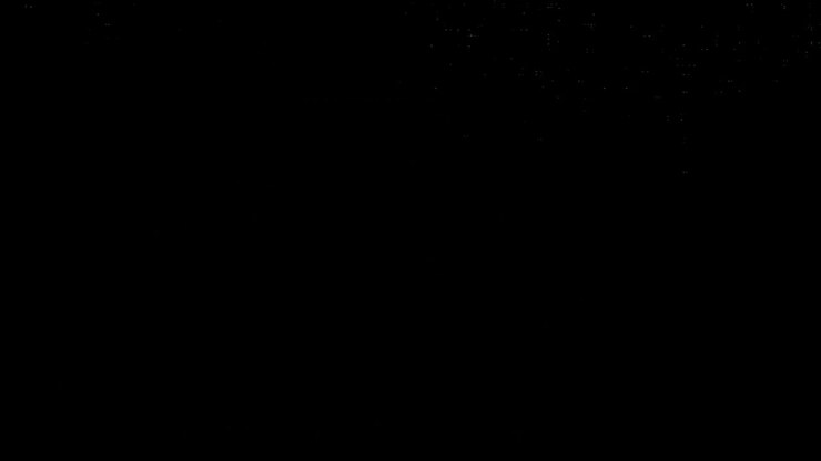 Strisce di luce astratte che si muovono su sfondo scuro.