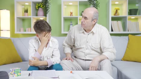 A-grandfather-trying-to-understand-his-crying-grandson.