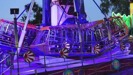 rotating amusement ride with vibrant lights