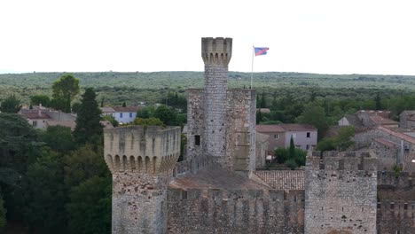 Slow-aerial-parallax-shot-of-the-beautiful-Chateau-de-Pouzilhac