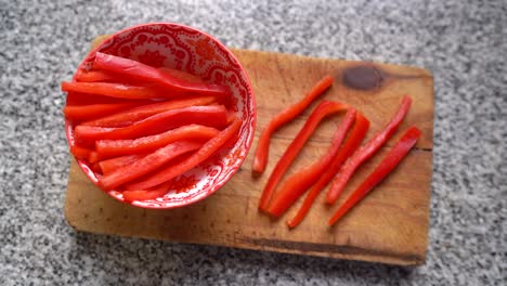 red bell pepper cut into strips. topdown shot