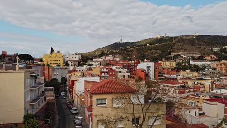 Panning-Left-To-Right-Timelapse-Of-Serra-De-Collserola,-Barcelona-City,-Taixonera