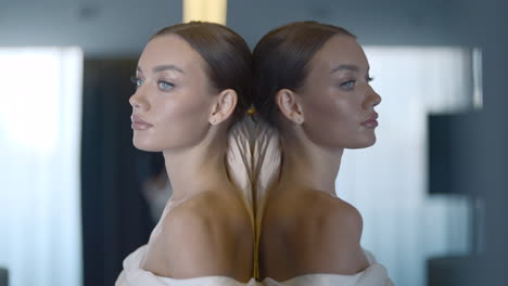 reflection of a woman in a stylish dress