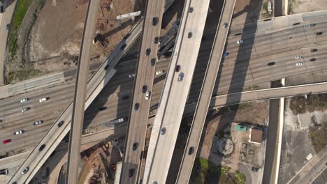 Birdseye-view-of-cars-on-59-and-610-South-Freeway-in-Houston,-Texas