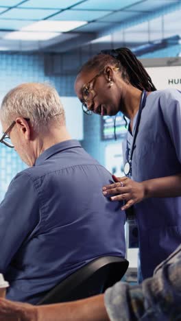 doctor examining patient's back