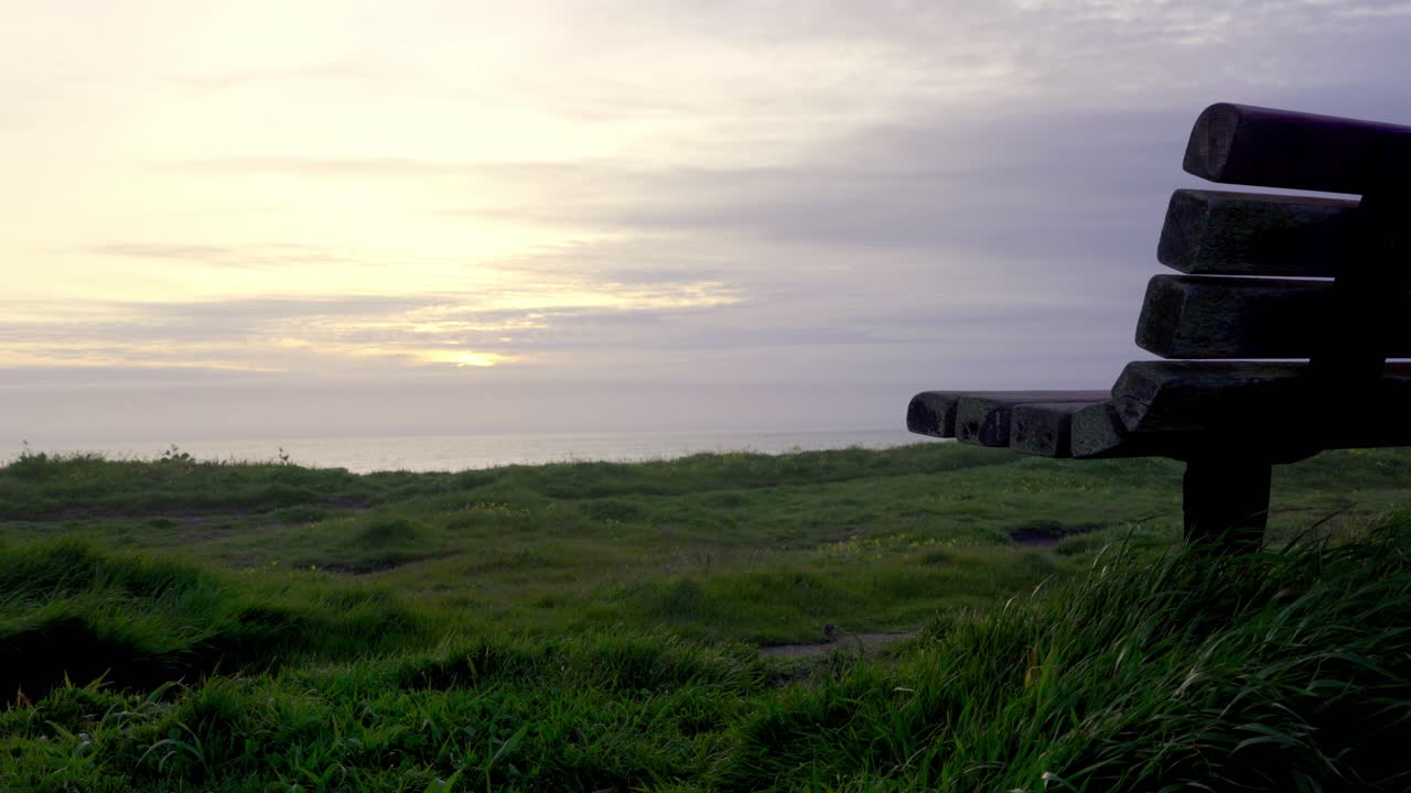 wooden bench at the beach, half moon bay 3