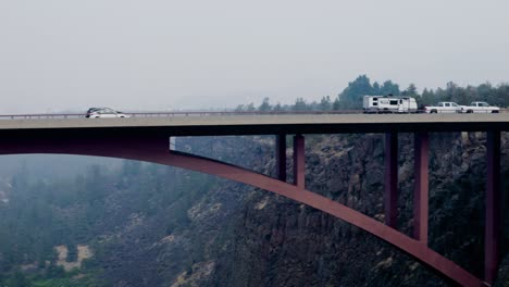 summer wildfire smoke over bridge highway in central oregon