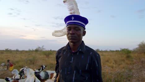a karamojong man gazing into the camera in karamoja, uganda, africa - close up