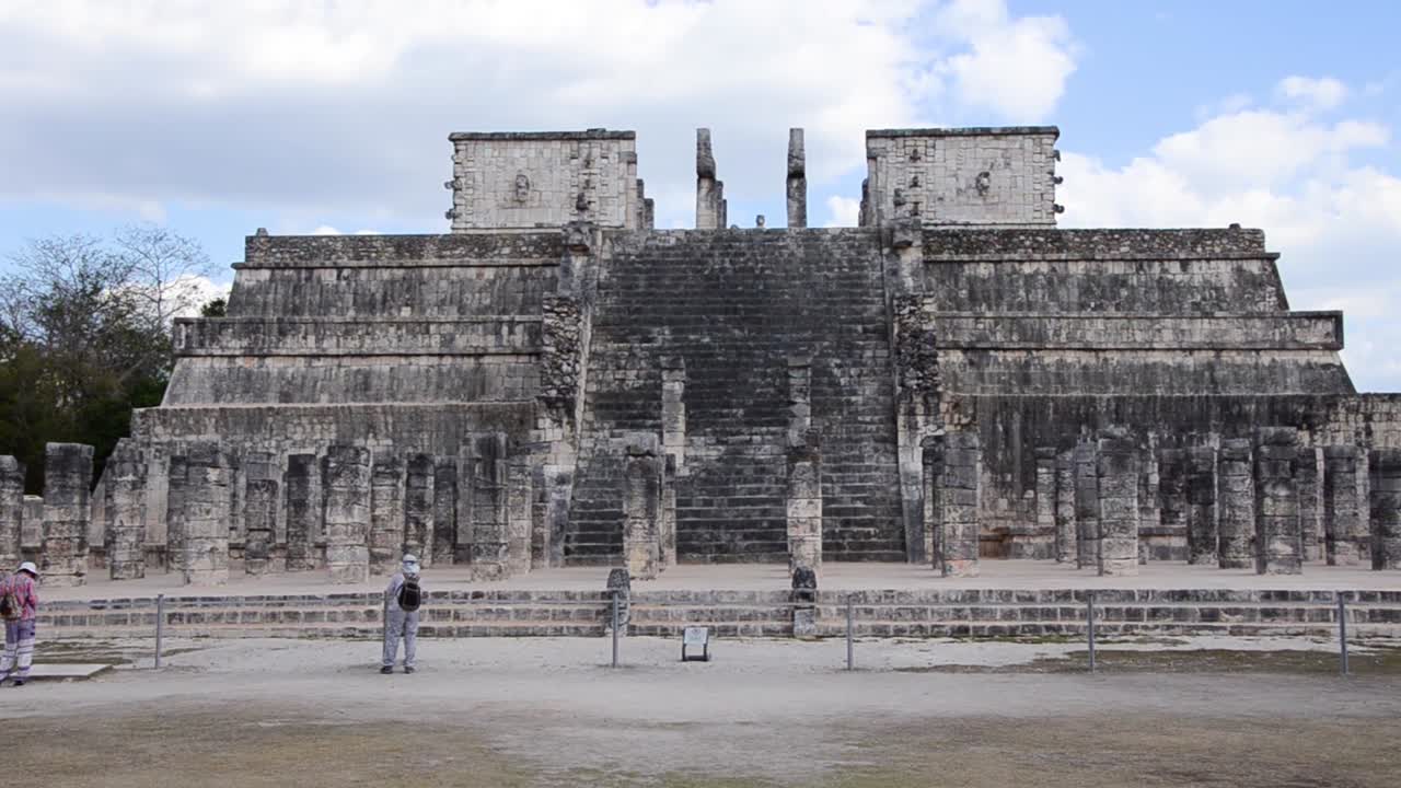 Tourists visiting Temple of a Thousand Warriors in the Chichen Itza archaeological site.