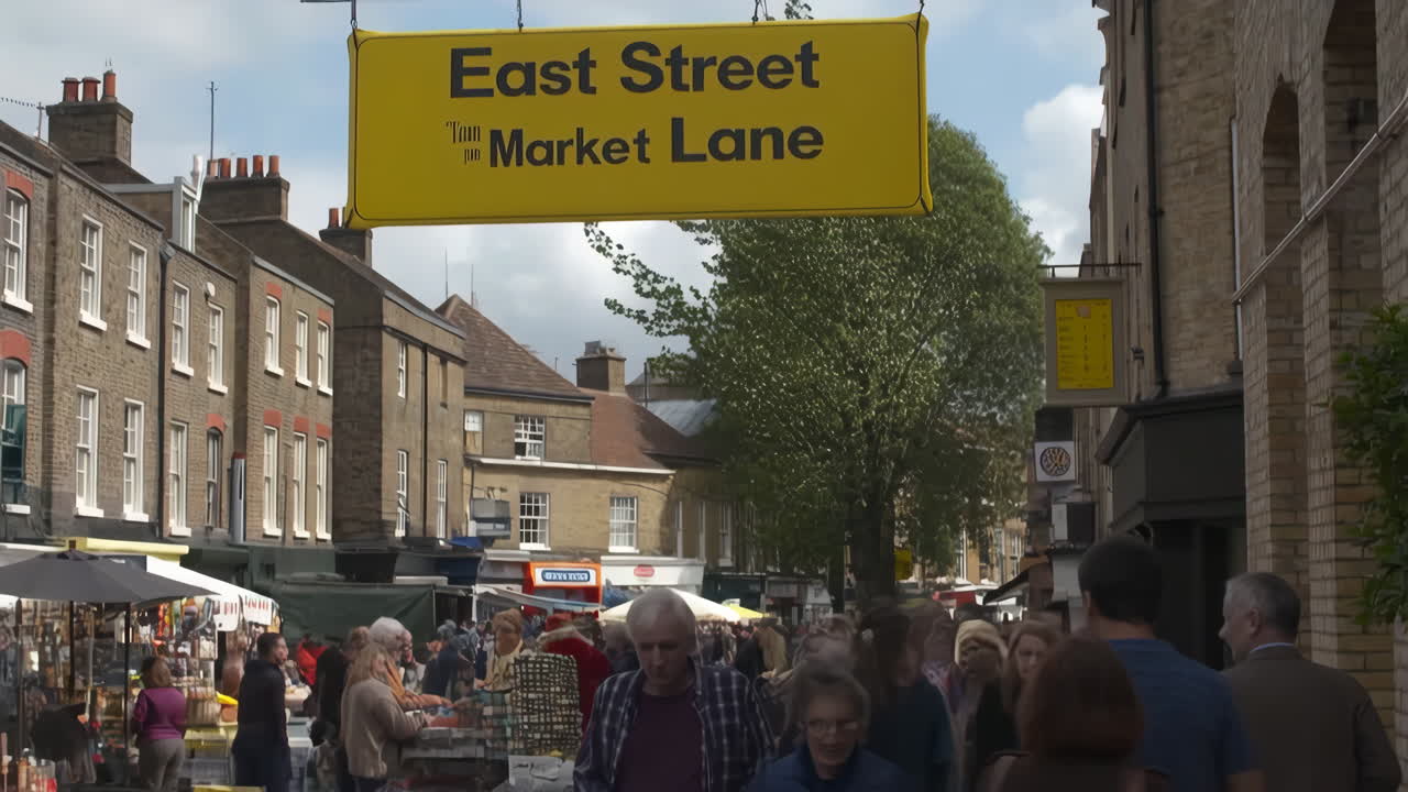 East Street Market Lane Sign Above a Bustling Market