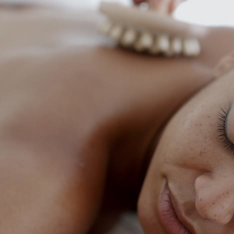 woman enjoying a back massage