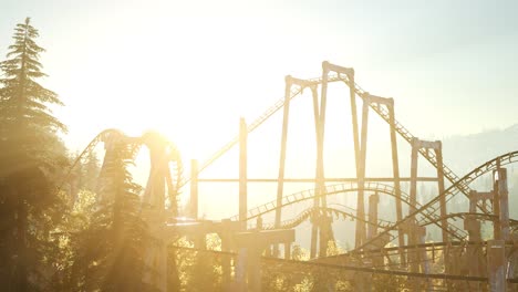 old roller coaster at sunset