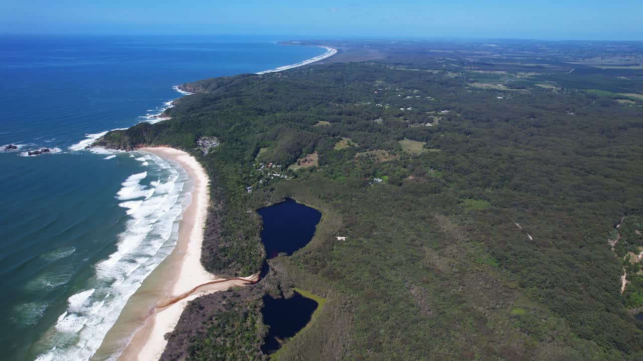 Broken Head Beach And Surrounding Lush Vegetation In New South Wales, Australia - Aerial Drone Shot
