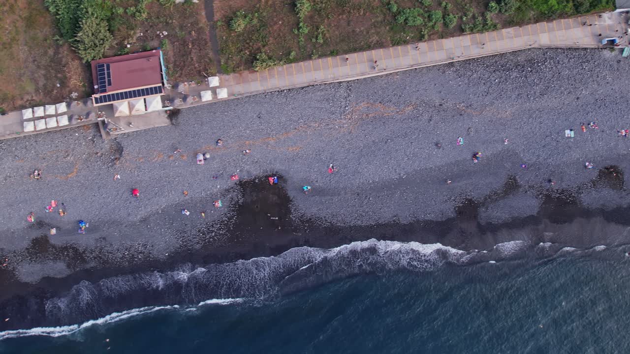 Aerial view captures the rocky beach of Madeira, Portugal on a sunny day